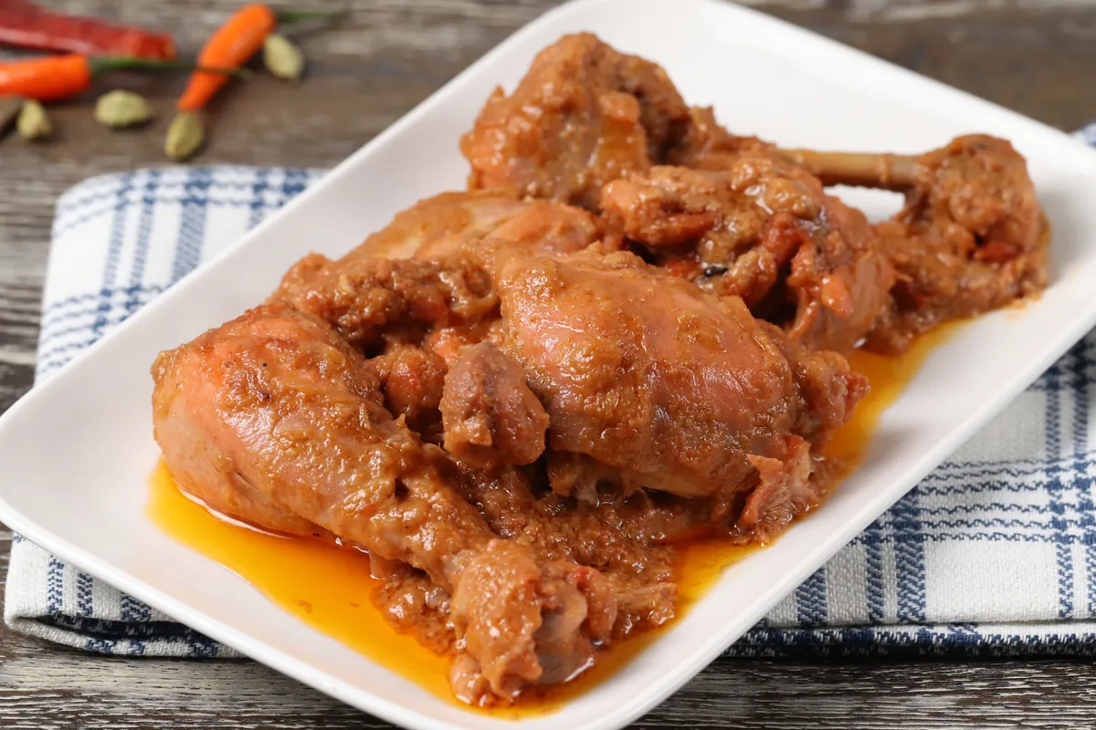 Bengali Chicken Roast - Spicy marinated chicken curry, a Sagar Restaurant specialty
